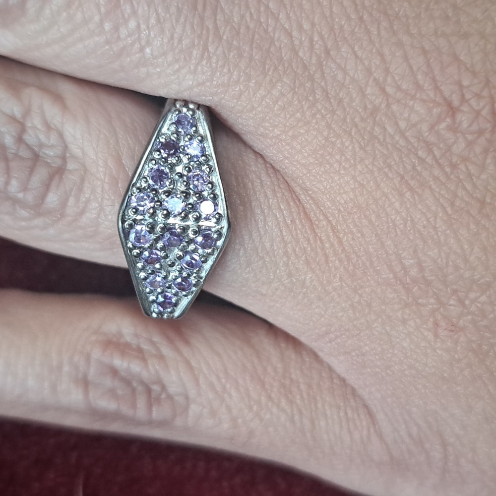 Sterling Silver Tanzanite Ring with Hearts.